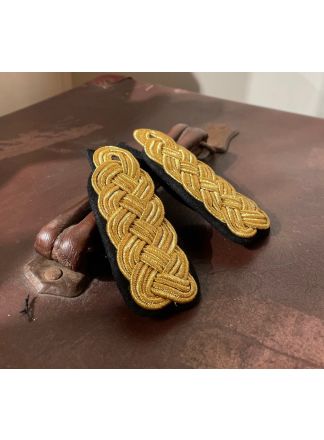 Gevlochten epauletten goud-zwart per paar